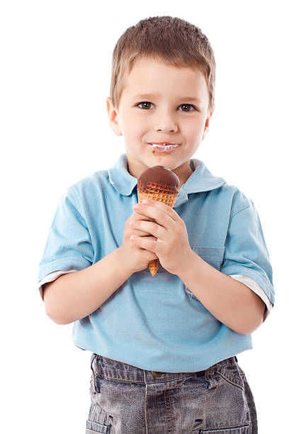junge mit kegel-eis - child chocolate ice cream human mouth stock-fotos und bilder