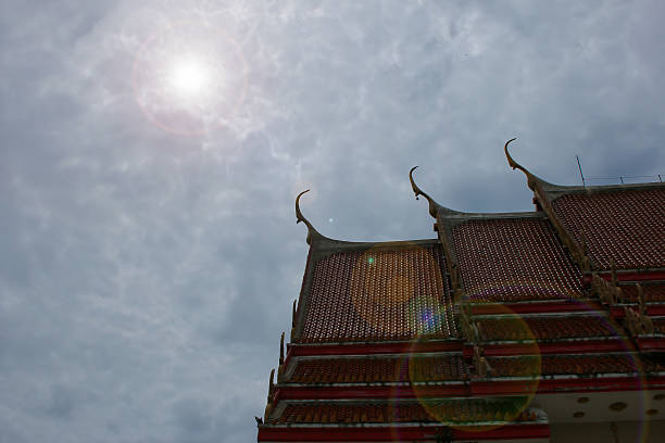 istock Silhouette Roof three layers on sky background and lens flare 483342092