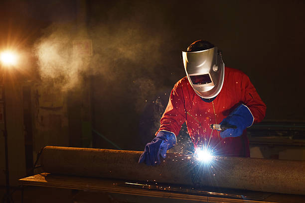 Welder engineer Welder in workshop safety american football player stock pictures, royalty-free photos & images