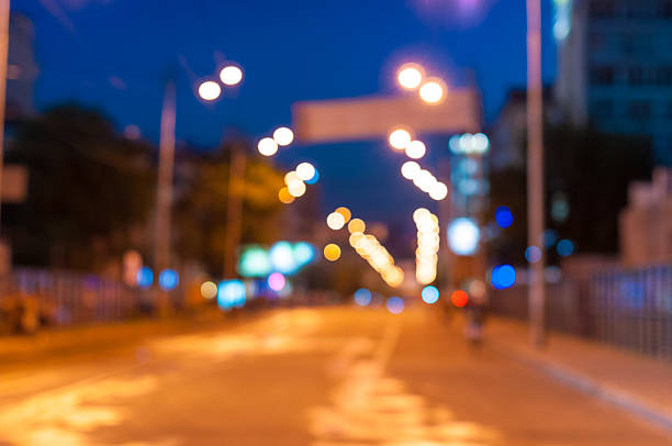 istock Beautiful blurred city background on dark 483342232