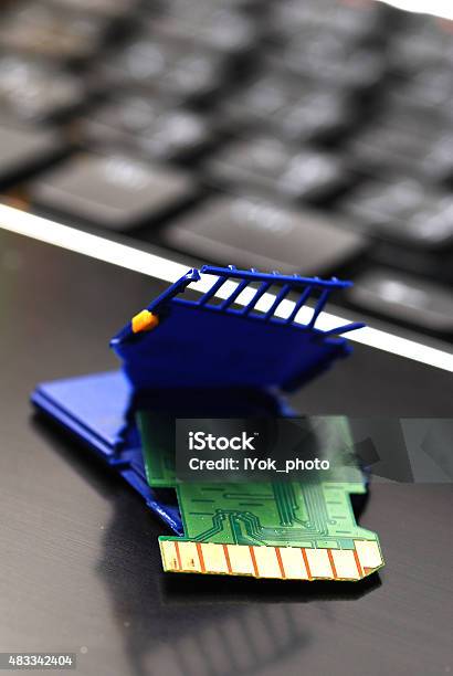 Damage Sd Card On Laptop Stock Photo - Download Image Now - DVD, Digitally Generated Image, Garbage