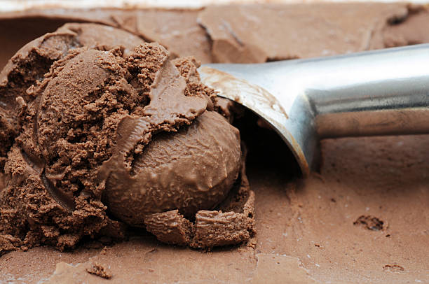 istock Ball of Chocolate ice-cream with scoop 483342643