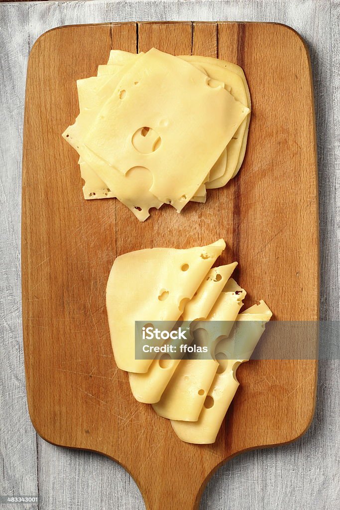 Rodajas de queso - Foto de stock de Agujero libre de derechos