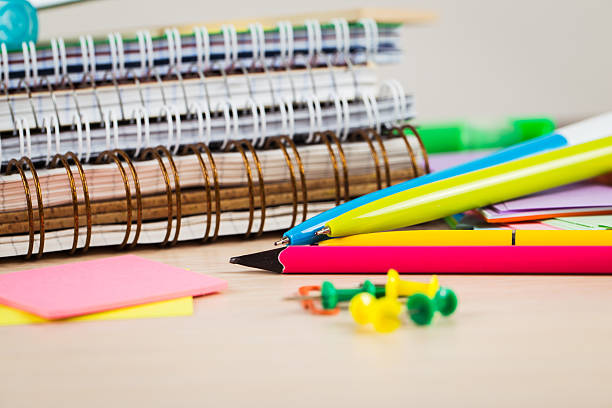 istock School and office accessories on wooden background 483343078