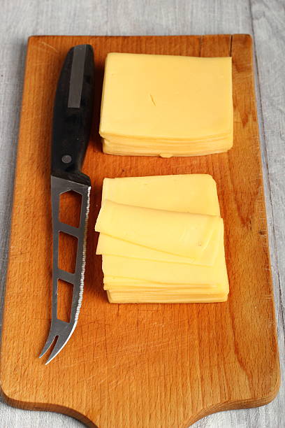istock Block of Sliced Cheese 483343231