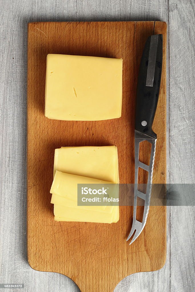 Bloque de rodajas de queso - Foto de stock de Alimento libre de derechos