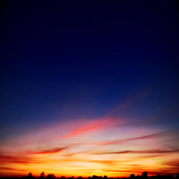 istock sunset in the village, in red colors 483344008
