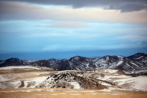 istock Winter Mt and clouds sky at sunset, Montana, USA 483344155