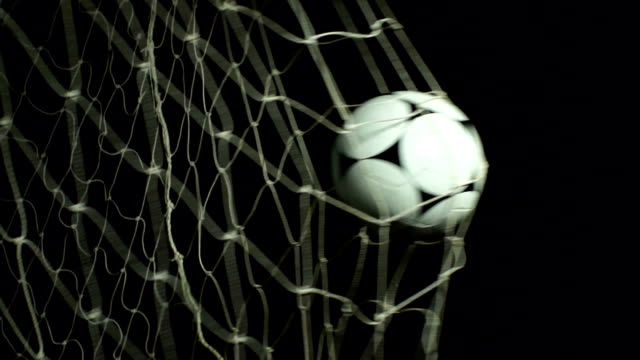 Football / Soccer ball into net - Scoring a Goal