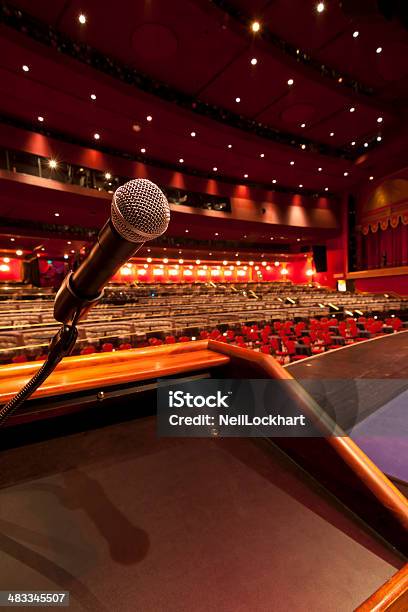 Microphone At Podium In Concert Hall Stock Photo - Download Image Now - Auditorium, Concert Hall, Empty