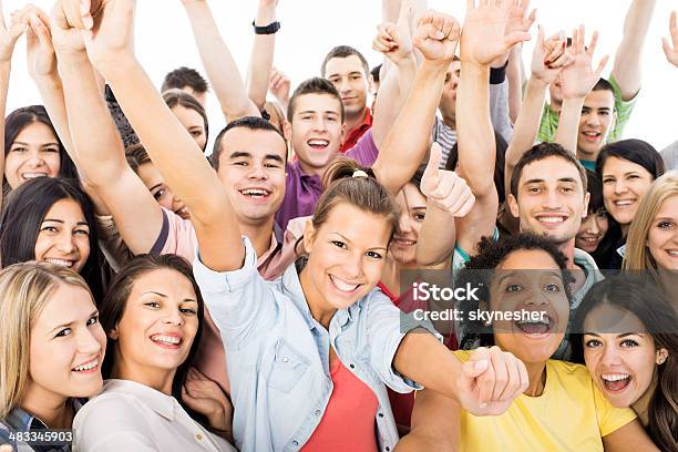 Group Of Happy People Stock Photo - Download Image Now - Adolescence, Adult, Arms Raised