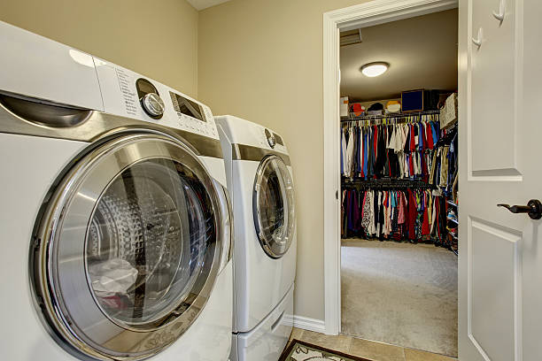 istock Excellent laundry room with washer and dryer. 483346606