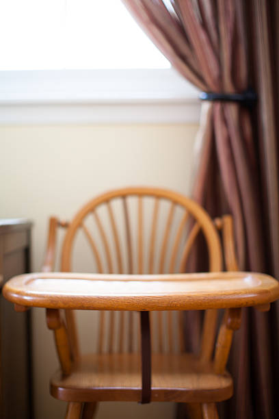 istock antique wood high chair 483346905