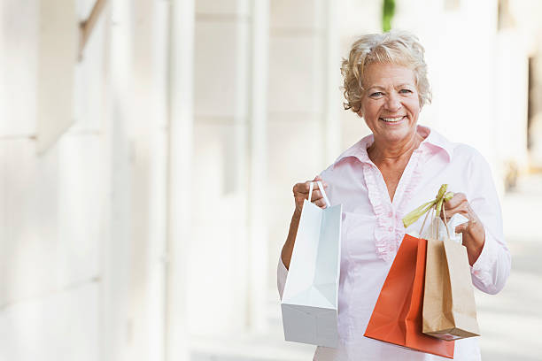 istock Senior woman shopping 483348259