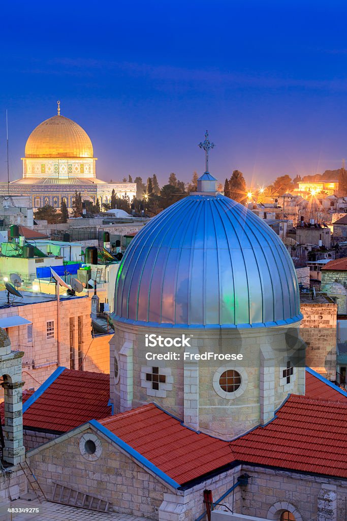 Jerusalem Jerusalem at dusk, with armenian catholic church "Our Lady of the Spasm" and the the Dome of the Rock in the back Israel Stock Photo