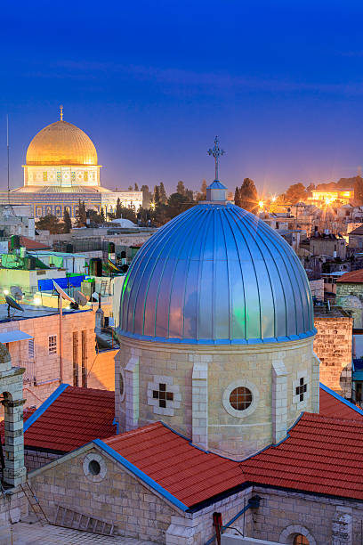 Jerusalem Jerusalem at dusk, with armenian catholic church "Our Lady of the Spasm" and the the Dome of the Rock in the back historical palestine photos stock pictures, royalty-free photos & images