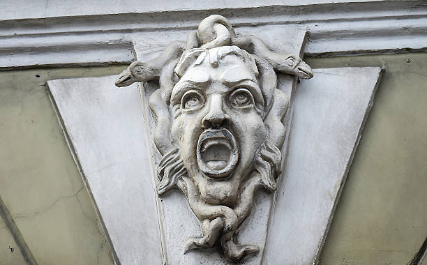 Mascaron on one of the houses on the street Glinka. Mascaron on one of the houses on the street Glinka. relieved face stock pictures, royalty-free photos & images