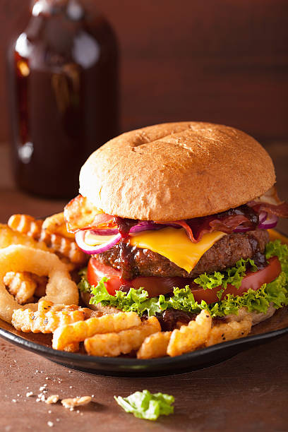 istock bacon cheese burger with beef patty tomato onion 483357510