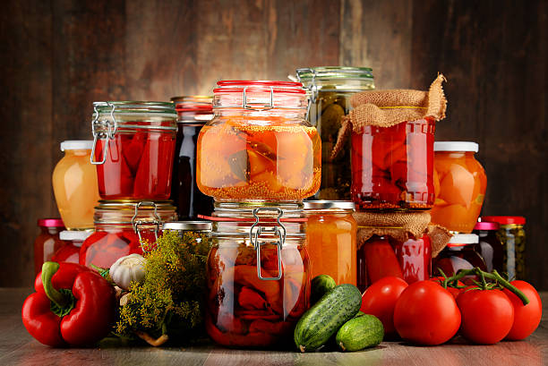 istock Jars with pickled vegetables and fruity compotes 483362826