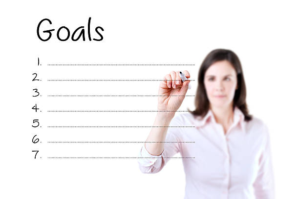 istock Business woman writing blank goal list. 483362886