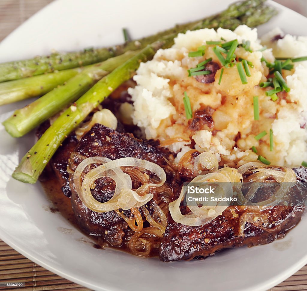 Liver With Onions Liver With Onions,Mashed Potatos and Asparagus 2015 Stock Photo