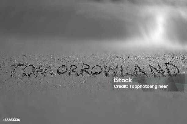 Tomorrowland Sign On A Beach In Black And White Colour Stock Photo - Download Image Now