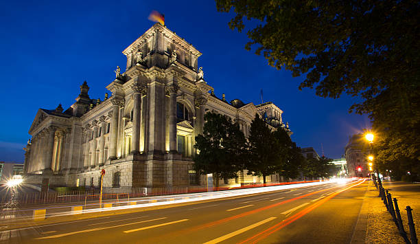 istock german bundestag berlin in the evening 483363764
