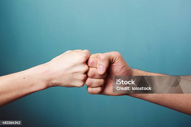 Fist Bump Stock Photo - Download Image Now - Fist, Colliding, Friendship
