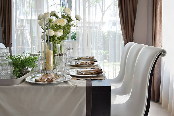 istock dining wooden table and comfortable chairs in modern home 483368354