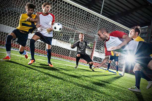 istock Football match in stadium: Header goal 483369593