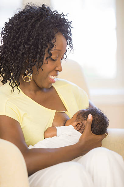 istock Mother cuddling with her baby 483375594