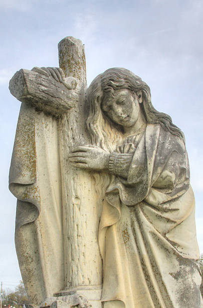 istock Cemetery Statue-Angel with Cross 483375706