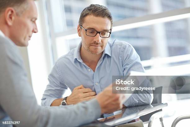 Businessmen With Tablet During Meeting Stock Photo - Download Image Now - Customer, Office, Technology