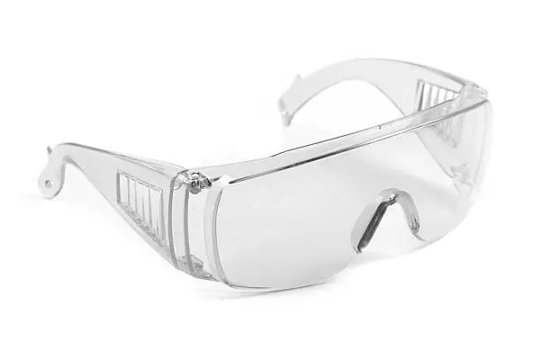 Photo of safety glasses isolated on white