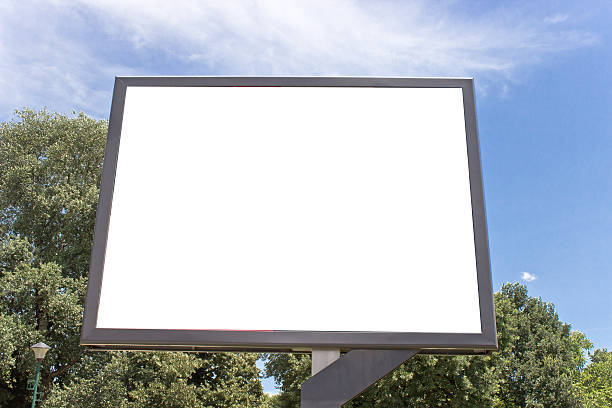 istock Blank billboard in a park with blue sky 483388408