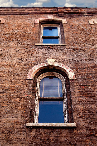 istock Late 18th century brick building with decorative windows 483390833
