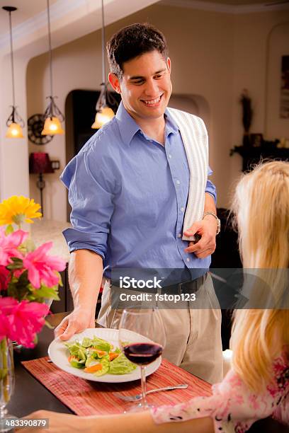 Modern Latin Man Makes Dinner For Wife At Home Stock Photo - Download Image Now - 20-29 Years, Adult, Adults Only