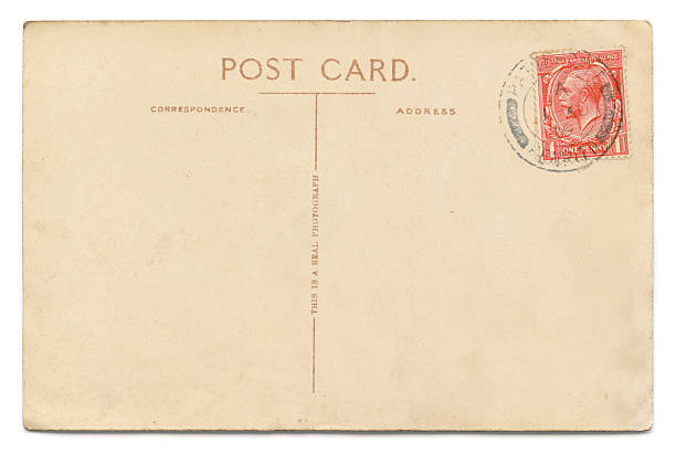 Vintage postcard on white Vintage, empty postcard with a One Penny George V stamp, cancelled in Patterdale (English Lake District), 1 Aug 1929. The postcard carries the phrase "This is a real photograph". Isolated on white with a soft shadow. Accurate clipping path provided. 1920 1929 stock pictures, royalty-free photos & images