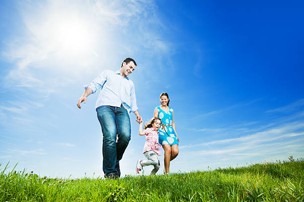 istock Happy family in park taking a walk. 483392433