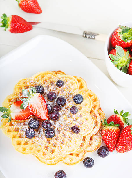 istock Crisp golden fresh baked waffle topped with pomegranate 483392833