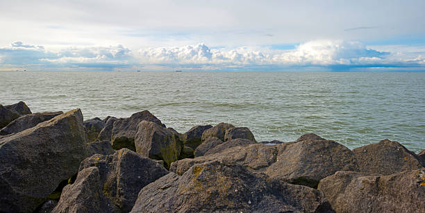 istock Barge sailing on the horizon of a lake in spring 483392841