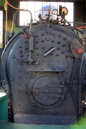 The boiler - firebox of an old steam engine.