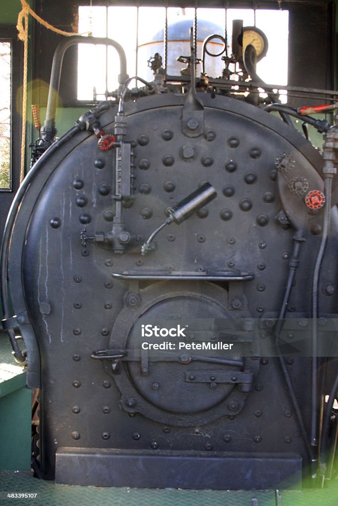 boiler The boiler - firebox of an old steam engine. Backgrounds Stock Photo