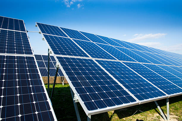 istock Solar panels on a sunny day against clear blue sky 483395381