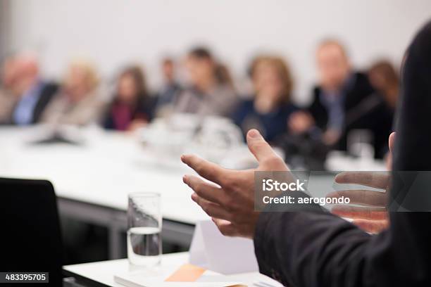 Man Having Presentation At Seminar Stock Photo - Download Image Now - Meeting, Discussion, Presentation - Speech