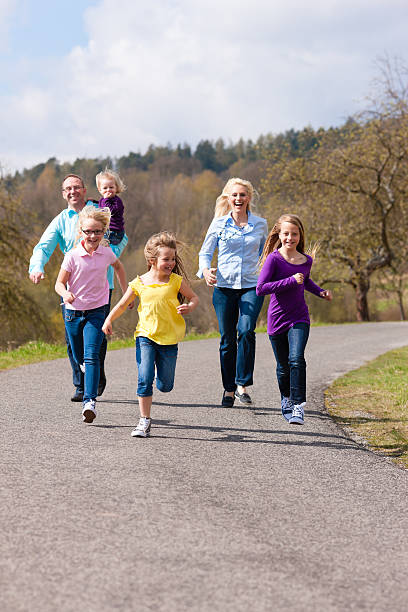 istock Family is running outdoors 483396161
