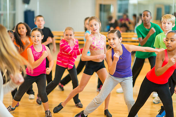 Dance Fitness Kids dance fitness class. dance studio instructor stock pictures, royalty-free photos & images