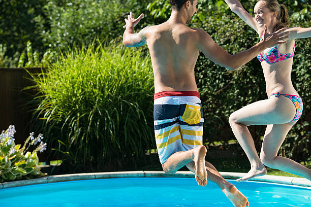 istock Jump In Swimming Pool 483396922