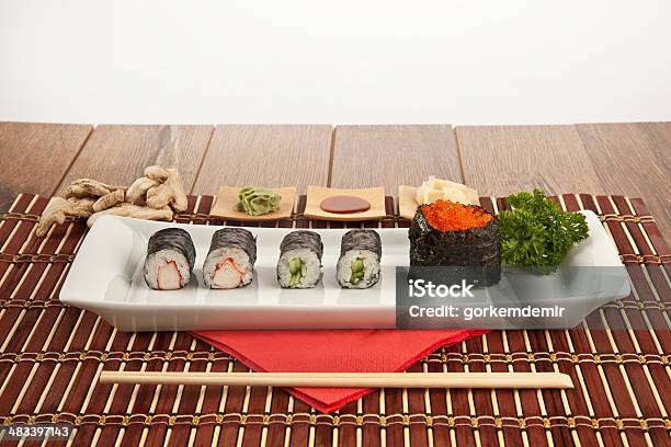 Kani Tobiko And Maki Sushi Rolls On White Plate Concept Stock Photo - Download Image Now