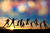istock so energic friends jumping at sunset 483405380